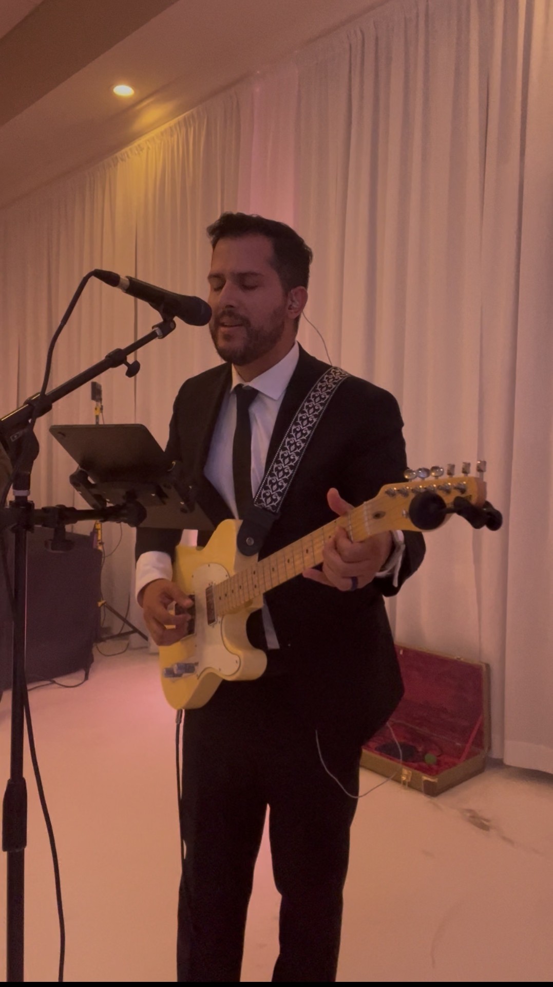 Harry J Mora performing live on guitar and vocals